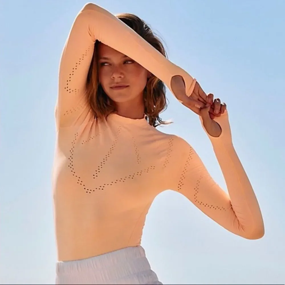 8. New! Free People Movement Good Karma Hi-Neck Layer Long Sleeve Top in Peach - Picture 3 of 12